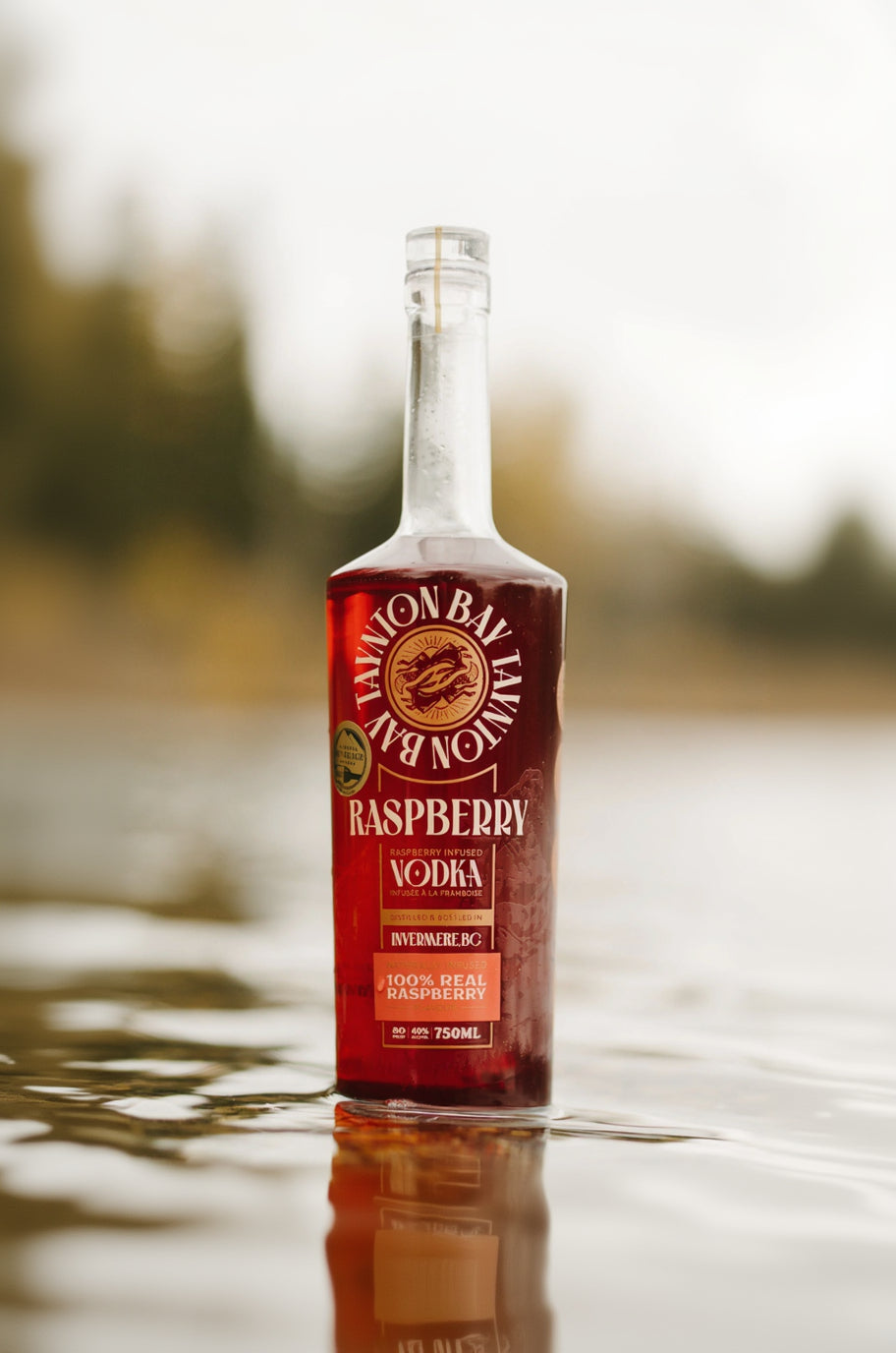 Bottle of Taynton Bay Raspberry Vodka with a natural background
